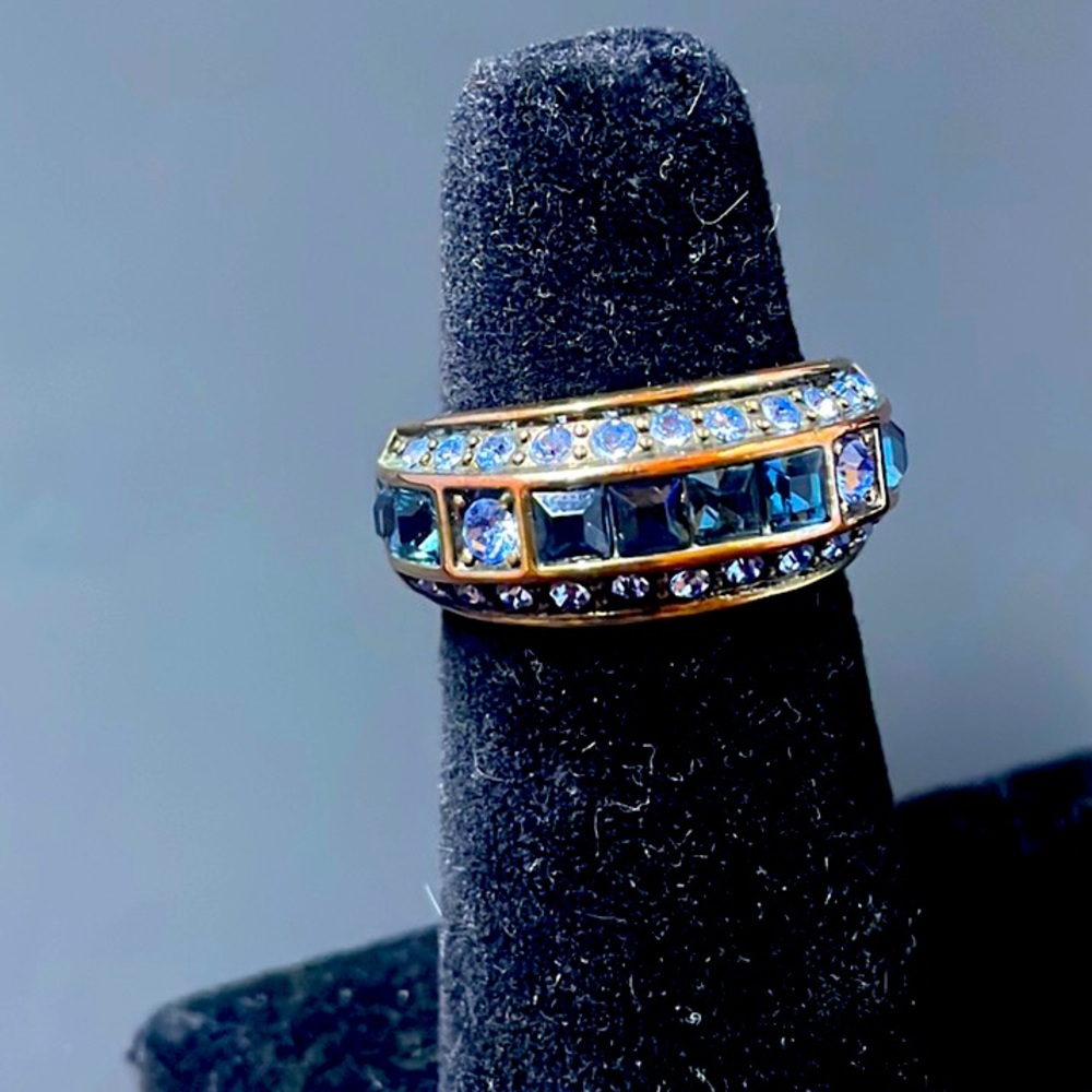 Heidi Daus Blue Montana three row pavé, set crystals in a ring band.